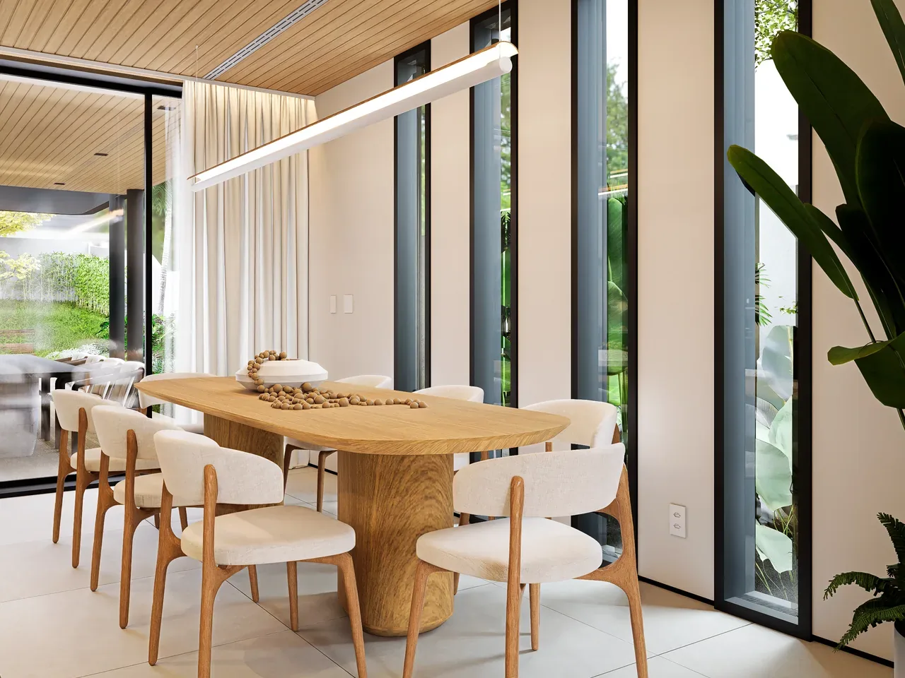 Sala de jantar com pé-direito e vidros altos